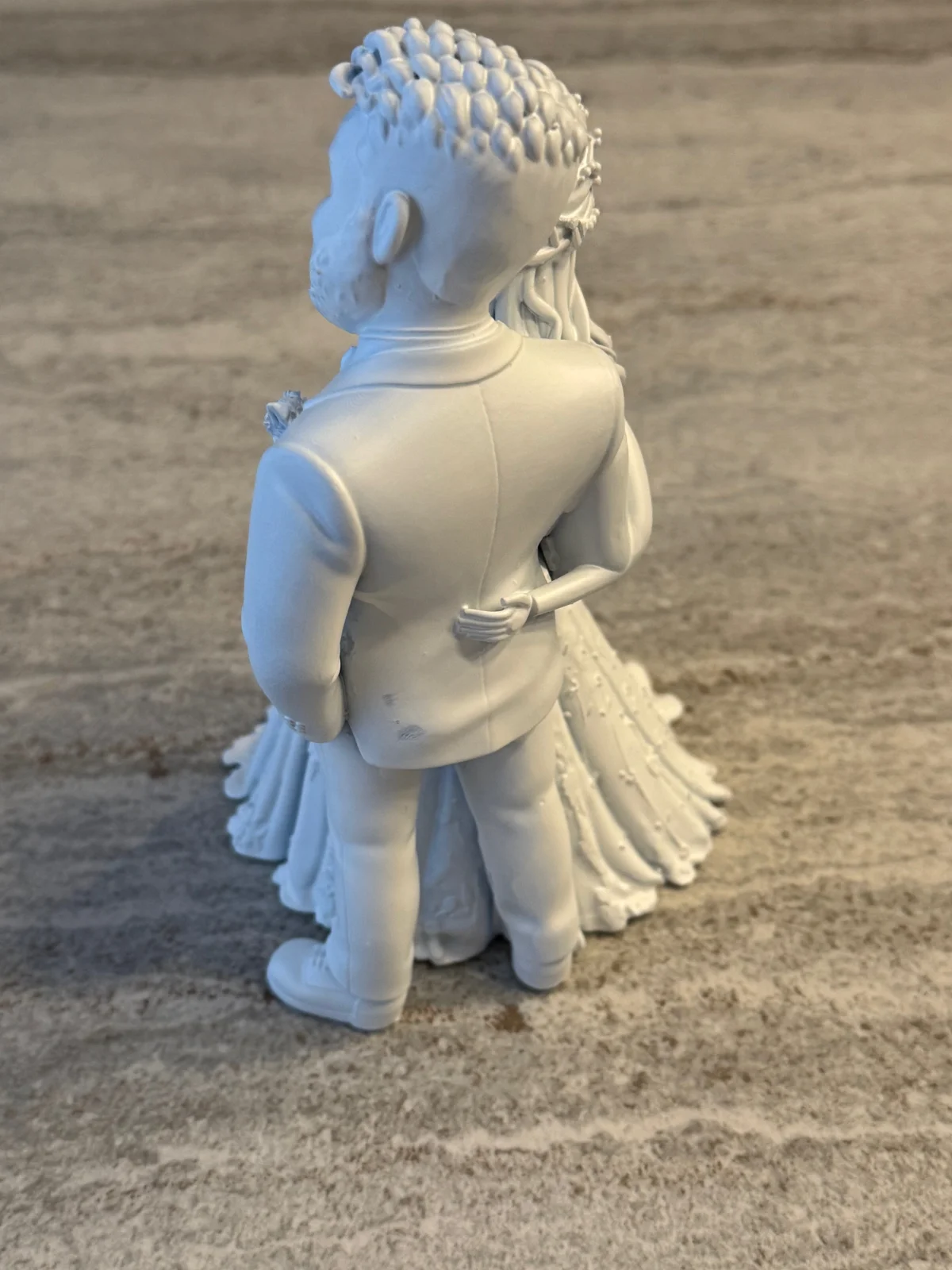 Die Figur von hinten
